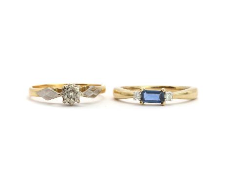 A 9ct gold single stone sapphire ring,with a rectangular step cut sapphire claw set to the centre, accented by a round brilli