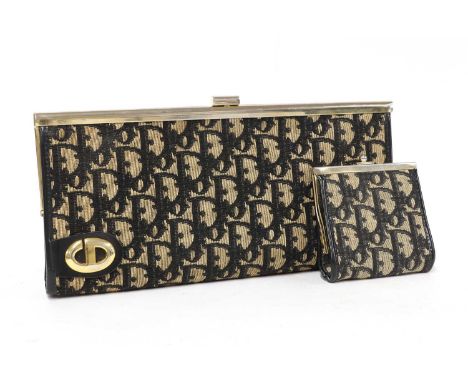 A Christian Dior vintage clutch bag,neutral canvas with black Dior logo, gold-tone hardware, black leather interior, with ori