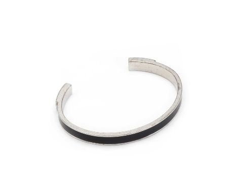 A sterling silver Dunhill open cuff bangle,6mm wide, with inset black leather section, marked AD Dunhill 925 on reverse, 22.2