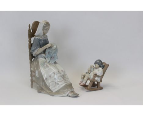 Two Lladro porcelain figures - seated lady in high back chair doing embroidery and young girl in rocking chair CONDITION REPO