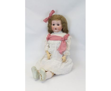 Doll - Armand Marseille bisque head A 975 M Germany 15. - brown sleeping eyes, open mouth top two teeth showing, composite bo