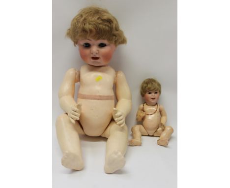 Dolls - German bisque head, blue sleeping eyes, composite body and bent limbs, short light brown hair, open mouth - tongue sh