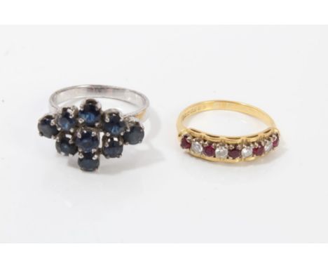 Gold (18ct) ruby and diamond half eternity ring, size K½, together with a sapphire cluster ring, size M½ (2) CONDITION REPORT