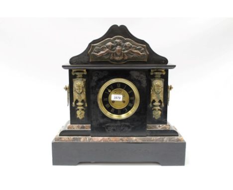 Late Victorian black slate mantel clock of large proportions, architectural form, with applied gilt metal mounts and circular