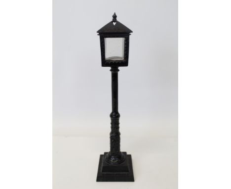 Rare and unusual Continental mid-19th century cast iron novelty light and watch stand in the form of a street lamp, with orig