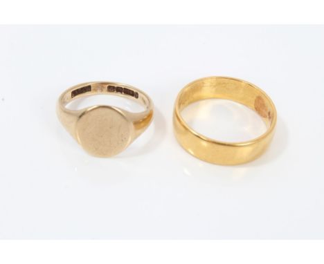 Yellow metal wedding ring (tests as 18ct - 22ct), together with a gold (9ct) signet ring CONDITION REPORT Yellow metal ring w