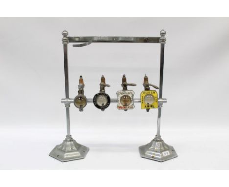 Vintage four-bottle bar stand with optics in chromium plated stand