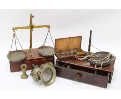 Three balances and weights and a Lightening cycle lamp