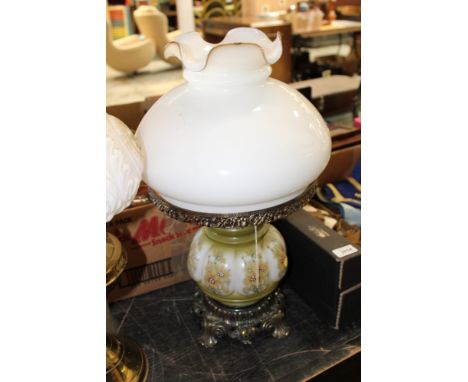 Three Victorian-style table lamps and a glass ceiling light with droplets