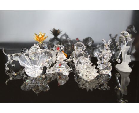 Selection of twelve Swarovski crystal models - Dalmatian, Small Pineapple, Clown / Puppet, Wolf, Bear with toy horse, Koala, 