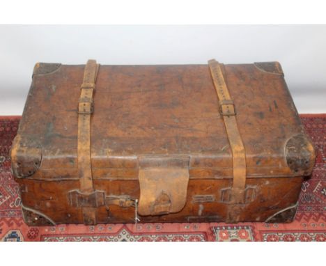 Large Edwardian heavy duty leather steamer trunk with wooden sliders underneath, by Army & Navy Co-Operative Society Ltd., li