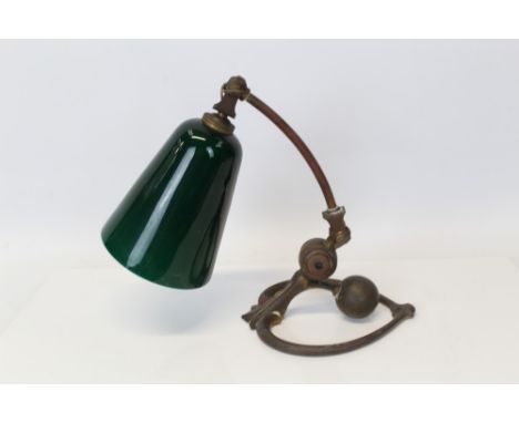 Early 20th century brass Art Nouveau-style desk lamp with green glass shade CONDITION REPORT Shade appears original, lamp req