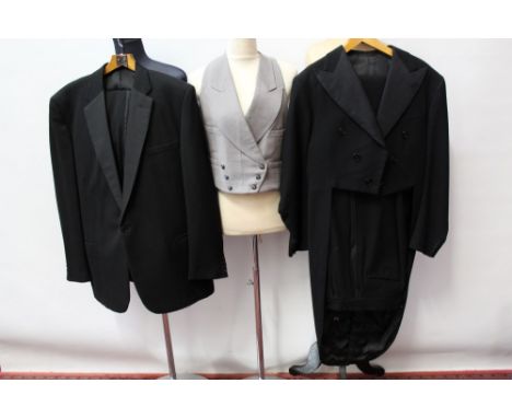 Gentlemen's 1940s / 1950s vintage clothing - black tailcoat with grosgrain lapels and trousers with side braiding, grey waist