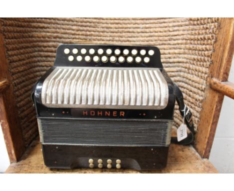 Vintage Hohner two-row 'Erica' accordion in associated case