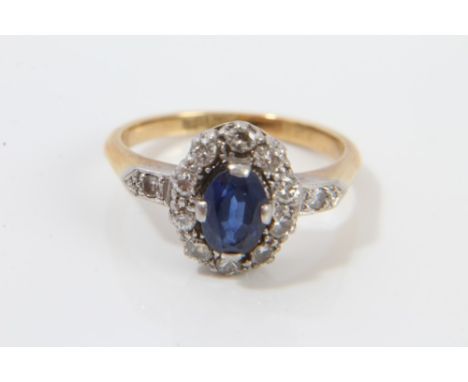 1920s gold (18ct) sapphire and diamond cluster ring in platinum setting, with diamond set shoulders.  Ring size M CONDITION R