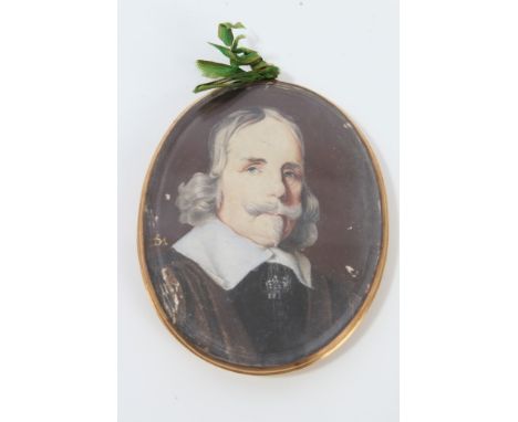Antique watercolour portrait miniature of a gentleman, signed with monogram, in oval yellow metal mount, 5.5cm x 4.5cm