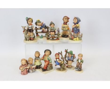 Collection of twelve Hummel figures - including Feeding Time, Be Patient, Angel Serenade, etc CONDITION REPORT Three figures 