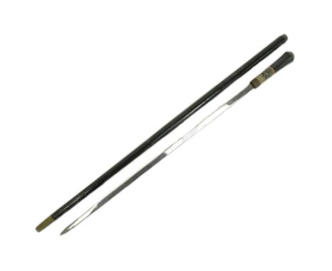 A 19th Century Victorian gentleman's sword stick / walking cane with concealed blade. The stick with lions head to the pommel