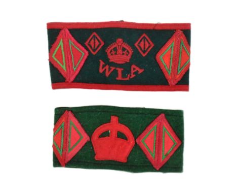 Two WWII Second World War WLA Women's Land Army uniform armbands. Green with red felt patches and button fastening.