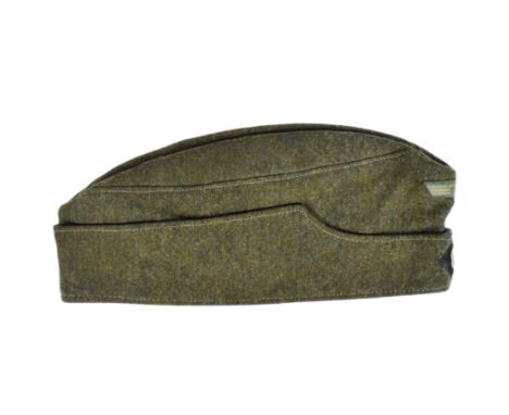 A WWII Second World War Third Reich Nazi German Officers M43 overseas side cap. Field grey wool construction with a green bac