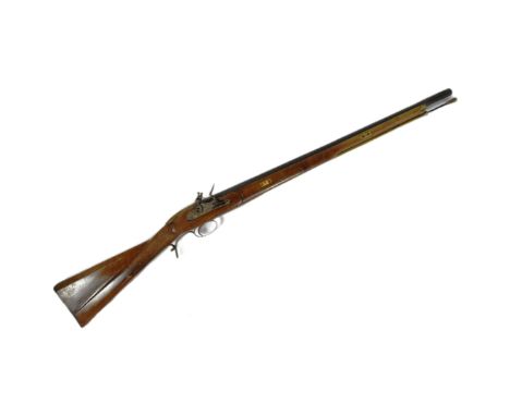 A 19th Century flintlock musket rifle. The barrel marked with a crowned BP for Birmingham proof test. Mechanism cocks, half c