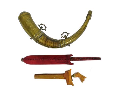 A collection of assorted tribal related items comprising a North African Moroccan powder flask. Horn construction overlaid wi