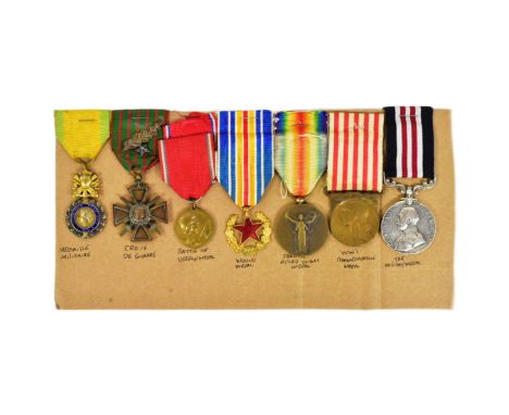A WWI First World War medal group awarded to a French Soldier during the Battle of Verdun. Medals comprising; French Allied V