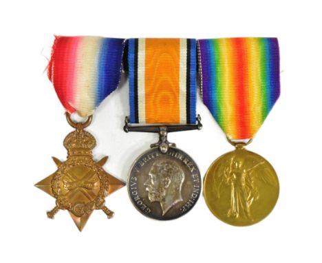 A WWI First World War medal trio awarded to one J35331 C H Davies of the Royal Navy. Rank illegible. Suspended on original ri