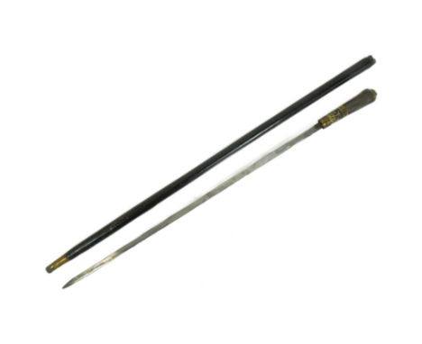 A 19th Century Victorian gentleman's sword stick / walking cane with concealed blade. The stick with lions head to the pommel