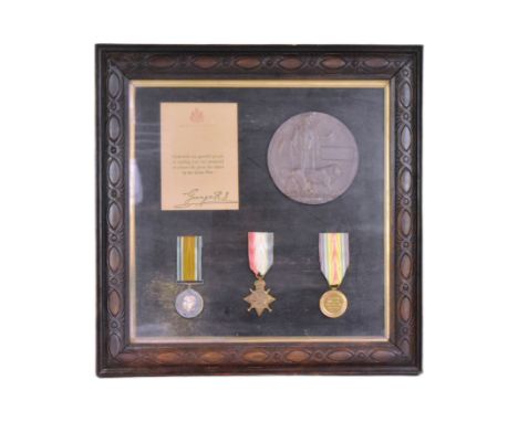 A WWI First World War medal trio along with death plaque / penny awarded to one 14559 Private William Evans of the 7th Battal