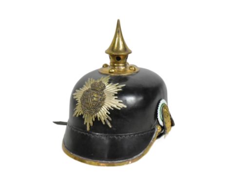 A reenactment WWI First World War Imperial German / Prussian Empire Saxon Cuirassier pickelhaube helmet. Starburst helmet pla