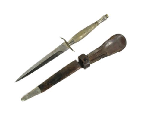 An original FS Fairbairn Sykes issued 1st Pattern commando fighting dagger with scabbard. Ricasso with Wilkinson Sword London