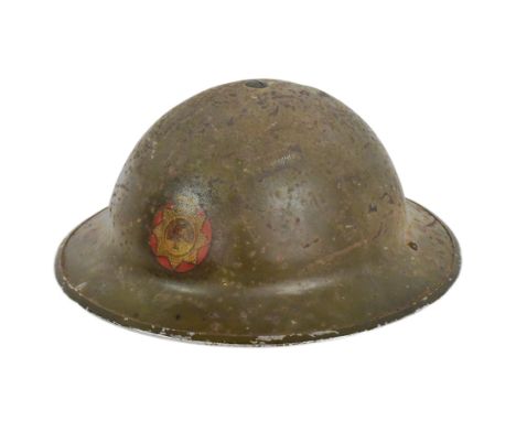 A WWII Second World War NFS National Fire Service MKII helmet. The steel brodie helmet with NFS emblem to the front. Dated 19