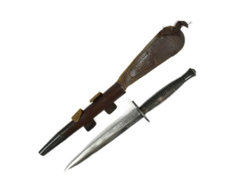 A WWII Second World War 3rd Pattern British FS Fairbairn Sykes Commando fighting knife dagger. Ribbed hilt with an oval cross