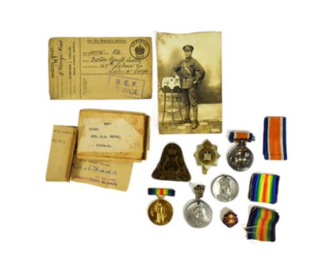 A WWI First World War medal pair awarded to one 53496 Pte H. A Exton of the Devon Regiment comprising his Victory medal and B