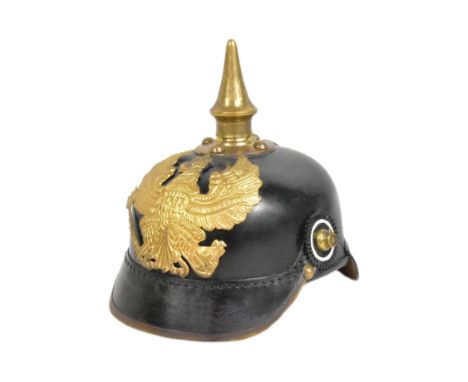 A reproduction WWI First World War Imperial German / Prussian Army 1860 pattern pickelhaube helmet. Leather construction with