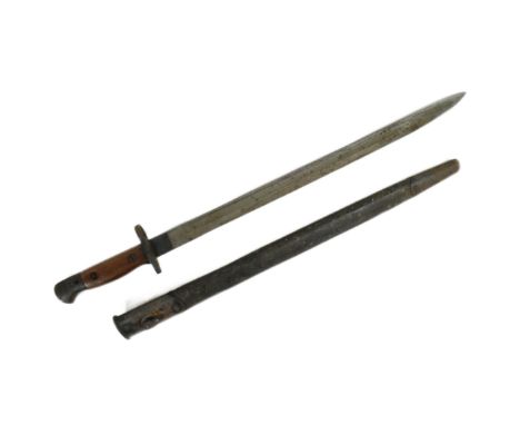 A WWI First World War British 1907 pattern Enfield rifle bayonet. Hooked pommel with working press stud, wooden grip and cros