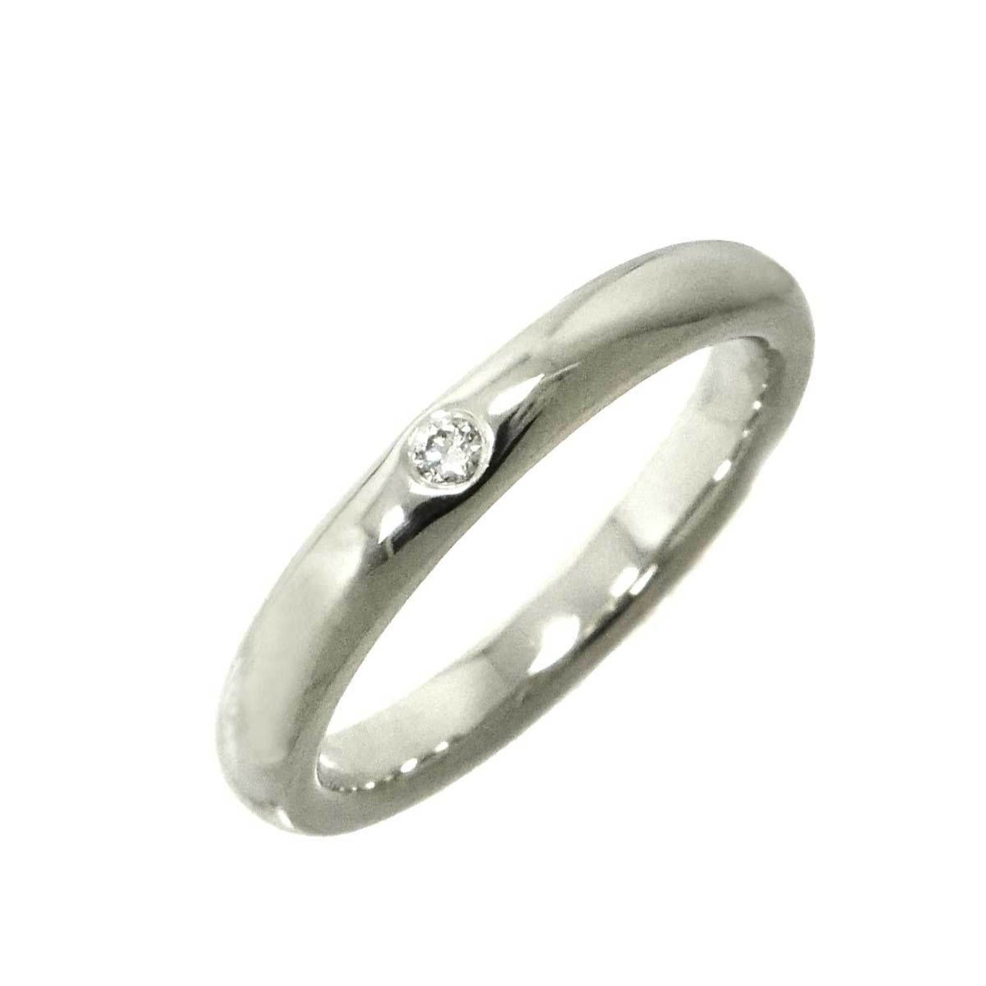 Tiffany & Co. Stacking Band Ring, size 6.5, with one diamond and platinum accents.
