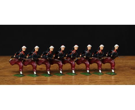W Britain (Britains) The French Army Zouaves from set No.142, comprising eight figures, each charging with fixed bayonets, un