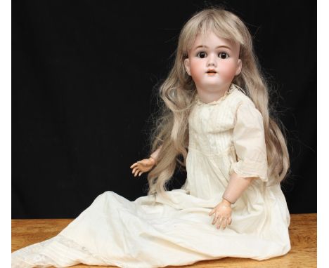 A Heinrich Handwerck/Simon &amp; Halbig (Germany) bisque head and ball jointed painted composition bodied doll, weighted slee