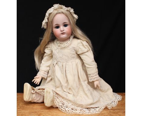 A Simon &amp; Halbig/Kammer &amp; Reinhardt (Germany) bisque head and ball jointed painted composition bodied doll, weighted 