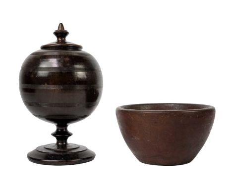 A treen turned globe jar and cover on pedestal base. Height 19cm together with a turned bowl. (2)