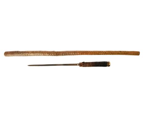 A late 19th century sword stick. Stick length 93cm blade length 30cm.There are a few splits and cracks on the stick, and a li
