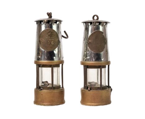 Two Brass and steel Protector Lamp & Lighting Co Eccles Miner's lamps Each with indistinctly stamped labels, height 25cm (2).