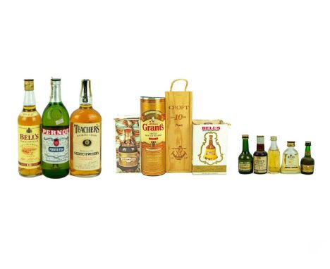 A bottle 10 Years Old Croft Port. Together with Grants Scotch Whisky, Teachers Scotch Whisky, Bells Whisky, Drambuie, a comme