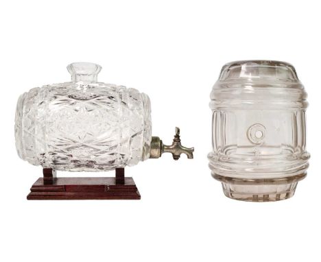 A late George III glass spirit barrel. With slice cut and applied ring decoration, and a grey tint, length 19.5cm, together w