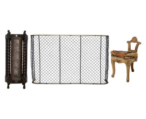 A caned stick stand 75cm high, a nursery fender Height 70cm, width 105.5cm, depth 31cm, and a French walnut three-legged stoo