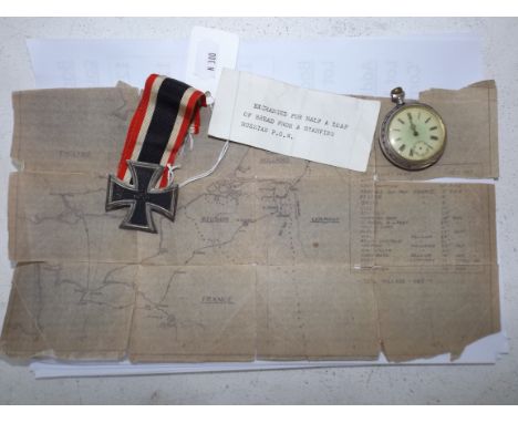 A WWII iron cross with pin back, a pocket watch a/f, and a part paper map of England and mainland Europe, circa 1940's