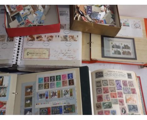 A well filled red Movaleaf stamp album, together with first day covers and loose stamps.