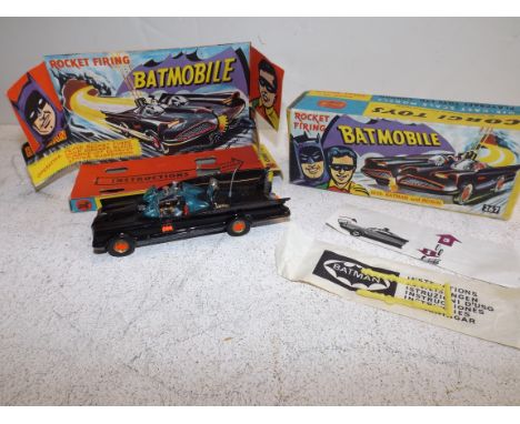 Corgi:- 267 Batmobile, light chipping, box age worn, no missiles.
